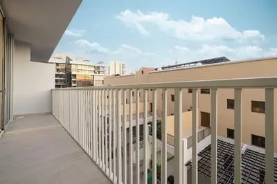 a balcony with a view of the city at Restay Homes at Luma22 West Tower in Dubai