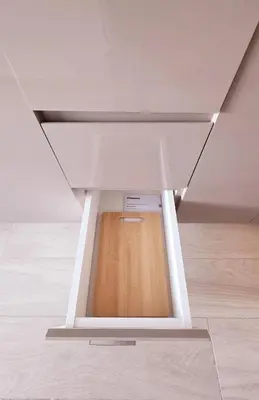 a white table with a wooden floor in a room at Modern Deluxe Studio in Dubai in Dubai