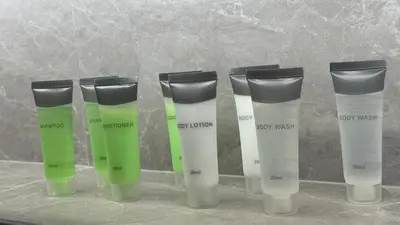 a group of four diffusers sitting on a counter at 1BDR Large Living Room Nearby Metro in Dubai