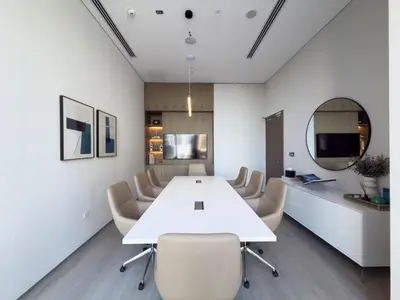 a conference room with a white table and chairs at Elegant 1BR LIV Marina Dubai World-Class Amenities in Dubai