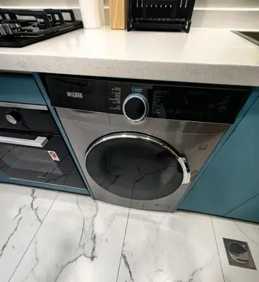 a microwave oven sitting on top of a kitchen counter at Modern Studio in Opalz - Ideal for Work & Leisure in Dubai