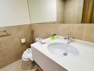 a bathroom with a sink and a toilet at Celestial 2BR with Burj Khalifa View in Dubai