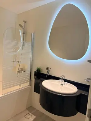 a bathroom with a sink and a shower at Lovely beach life 1 bed apartment in Dubai Marina in Dubai