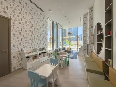 a dining room with tables and chairs and a wall of windows at Luxury 2BR LIV Marina Dubai World-Class Amenities in Dubai