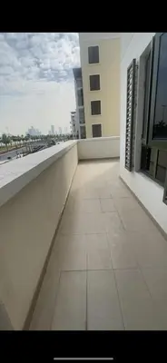a view of a balcony of a building at La Cote, free Beach access in Dubai