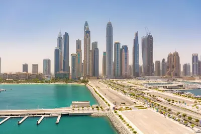 a view of a city with tall buildings at VayK - Elegant 2BR at Emaar Beachfront with Beach Access in Dubai