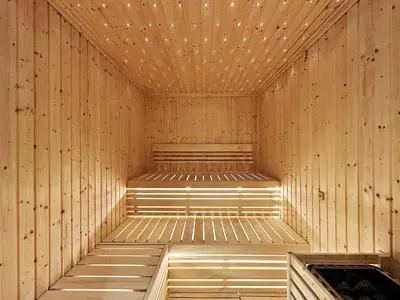 an empty sauna with wooden walls and ceilings at VayK - Newly Launched 1BR in Business Bay in Dubai