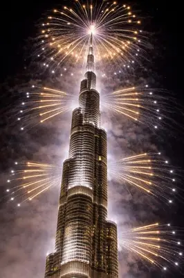 a fireworks display at the burj khalifa at night at Prime Downtown Luxury Stays by Burj Khalifa in Dubai