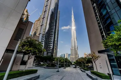 a city street with the tallest building in the city at Chic Downtown Act Tower Walk to Burj Khalifa&Mall in Dubai