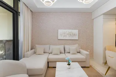 a living room with a couch and a table at Aykon City Tower C, Business Bay - Onelink in Dubai