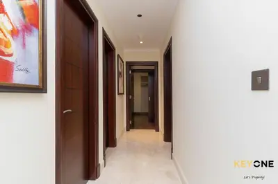 a corridor of a hallway with at Spacious Beachfront 2BR with Maids Room in Grandeur in Dubai