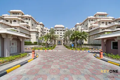 a view of a building from the street at Spacious Beachfront 2BR with Maids Room in Grandeur in Dubai