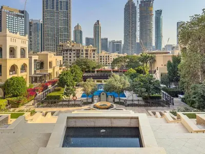 a view of a city skyline with tall buildings at Deluxe Arabian-Inspired One Bedroom Stay in Souk Al Bahar Downtown Dubai in Dubai