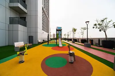 a playground in a building with two robots on it at SettlerHomes - Chic Cloud B - Pool, Gym & Court in Dubai