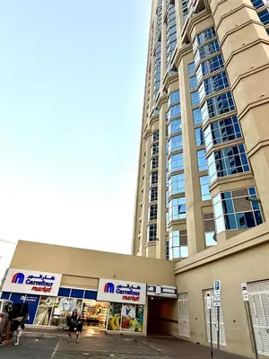 a tall building with people walking in front of it at Dreamy heaven Spacious 2BR Apt with marina view in Dubai