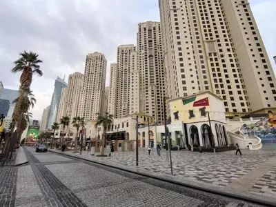 a street in a city with tall buildings at ZAH Luxury Holiday Home at JBR,Dubai in Dubai