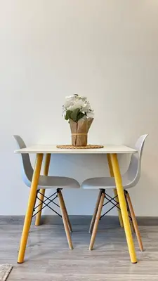 a table with a potted plant on top of it at Studio in central location with Balcony nearby Metro in Dubai