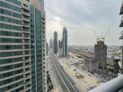 an aerial view of a city with tall buildings at Werova - Luxury 2BR Apartment w Breathtaking View in Dubai
