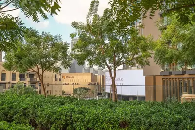 a view of a city with buildings and trees at Downtown Suite Trendy 1BR -Dubai Mall Access in Dubai