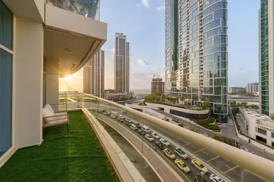 a view of a city freeway from a building at Coastal Elegance with PlayRoom PS5, 4BHK front JBR Beach Sleep 14 pax in Dubai