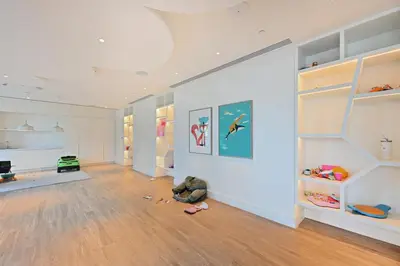 a room with a stuffed animal sitting on the floor at Creek Rise Tower 2 - 1BR with Creek Views, Panoramic Living, Dubai Creek Harbour in Dubai