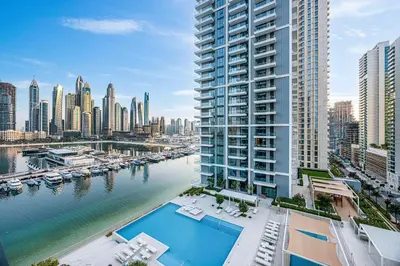 an aerial view of a large apartment building next to a river at Seaside Stay at Beach Mansion with Private Beach in Dubai