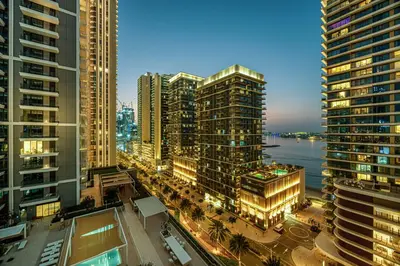 an aerial view of a city with tall buildings at Seaside Stay at Beach Mansion with Private Beach in Dubai