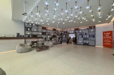 a large room with a bunch of lights in a building at Vogue Downtown Mag 318 near Burj Khalifa and Dubai Mall, Studio Apartment with Balcony, Pool and City View, Access to all Amenities in Dubai
