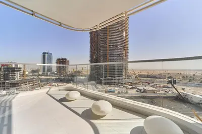 a view of a city from a building at Elegant 2BR Retreat at Opalz Arjan in Dubai