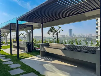 a pavilion on a building with a view of the city at Chic Studio near Dubai Miracle Garden & Expo City in Dubai