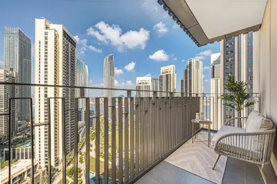 a balcony with a view of a city skyline at Daniels 2BR at Creek Gate with Canal View in Dubai
