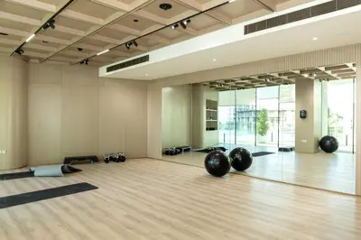 a yoga room with black pilates balls on the floor at Spacious and Cozy Apartment - Binghatti Phantom 2404 in Dubai
