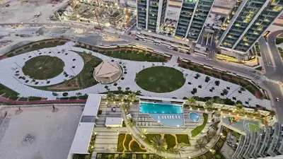 an overhead view of a park in a city at Bella-Rose-Fully Furnished Cozy High Floor Amazing View in Dubai