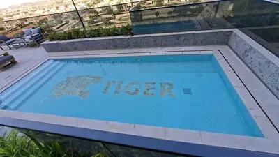 a swimming pool on top of a building at Cloud Tower 1br With Parking Pool Gym & Sports Facilities in Dubai