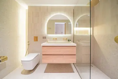 a bathroom with a toilet and a sink and a shower at Newly renovated, near the beach, with a Marina View in Dubai