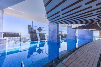 a view of a swimming pool in a building at Miracle View in Dubai