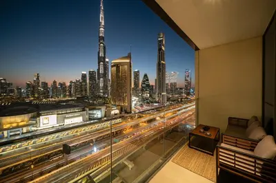 a room with a view of a city skyline at Seraya Residences at Downtown Views 1 in Dubai