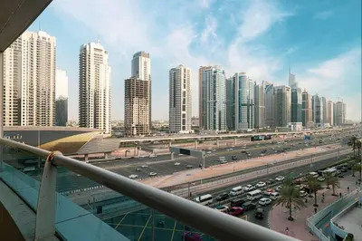 a view of a city with a highway and buildings at 1Bedroom in Marina with Metro and Tram Access in Dubai