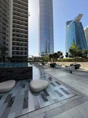 a view of a city with tall buildings at Zada Tower 1 Bedroom Apartment in Business Bay in Dubai
