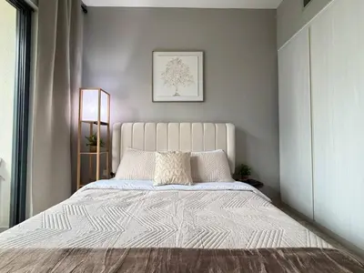 a bedroom with a large white bed in a room at Zada Tower 1 Bedroom Apartment in Business Bay in Dubai