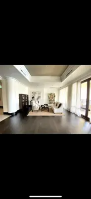a large living room with a couch and a table at Luxury Old Town Fountain View 2BHK front of Dubai Mall in Dubai
