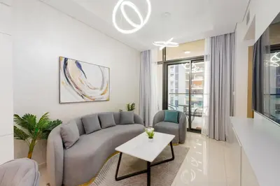 a living room with a couch and a table at Aykon City Tower C, Business Bay - Onelink in Dubai