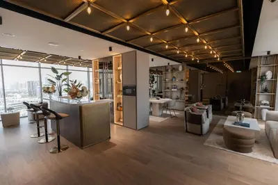 a room with a kitchen and a living room at Gracious Studio in Pearl House by Imtiaz in Dubai