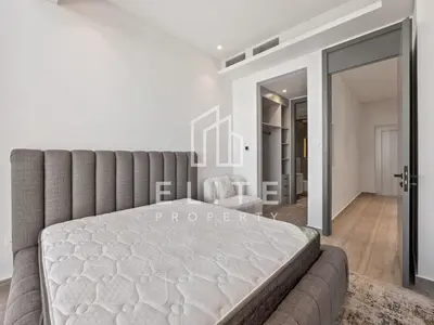 a bedroom with a large bed in a room at Luxury Ixora Family Villa in Dubai