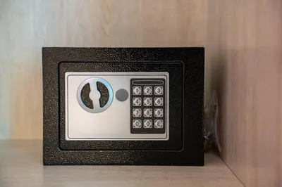 a small black and white radio sitting on a table at Luxury Studio with Private Beach Access - Palm Jumeirah in Dubai