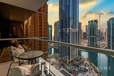 a balcony with a view of a city skyline at LUX The JLT Gold Crest Suite in Dubai