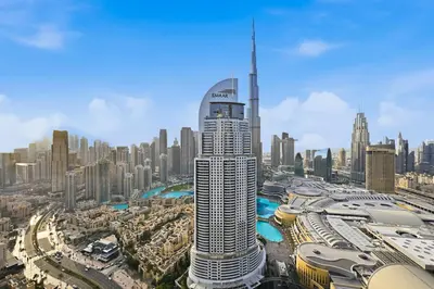 a view of a city with a tall building at Ultra Luxury 4BR 7P Burj and Fountain View in Dubai