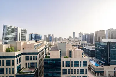 an aerial view of a city with tall buildings at Luxury Studio Cozy & comfy 12 Min Walk-Dubai Mall in Dubai