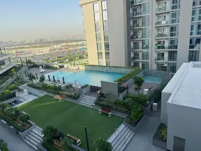 an aerial view of a swimming pool in a building at Creek Comfort and Coziness in Dubai