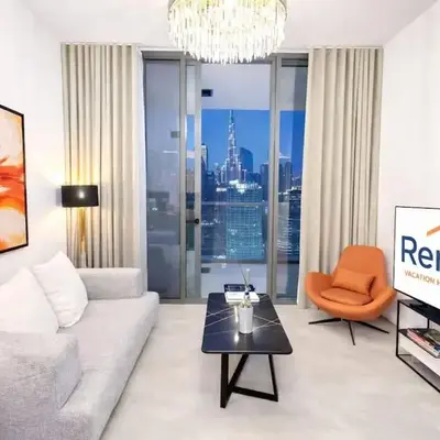 Rentico l Luxury 1BR with Burj Khalifa & Canal View